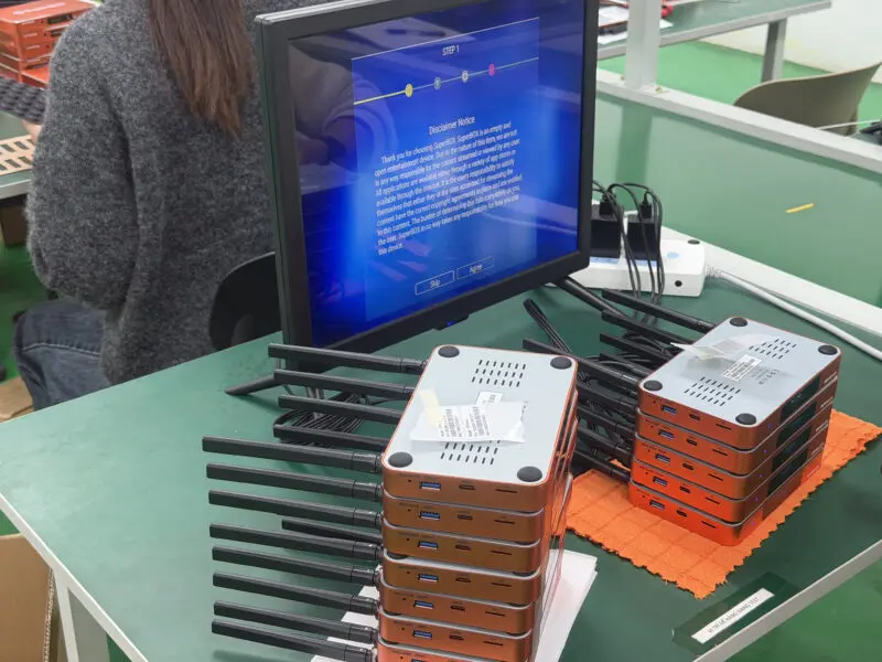 IMG_1751 technicians performing superbox hardware inspection