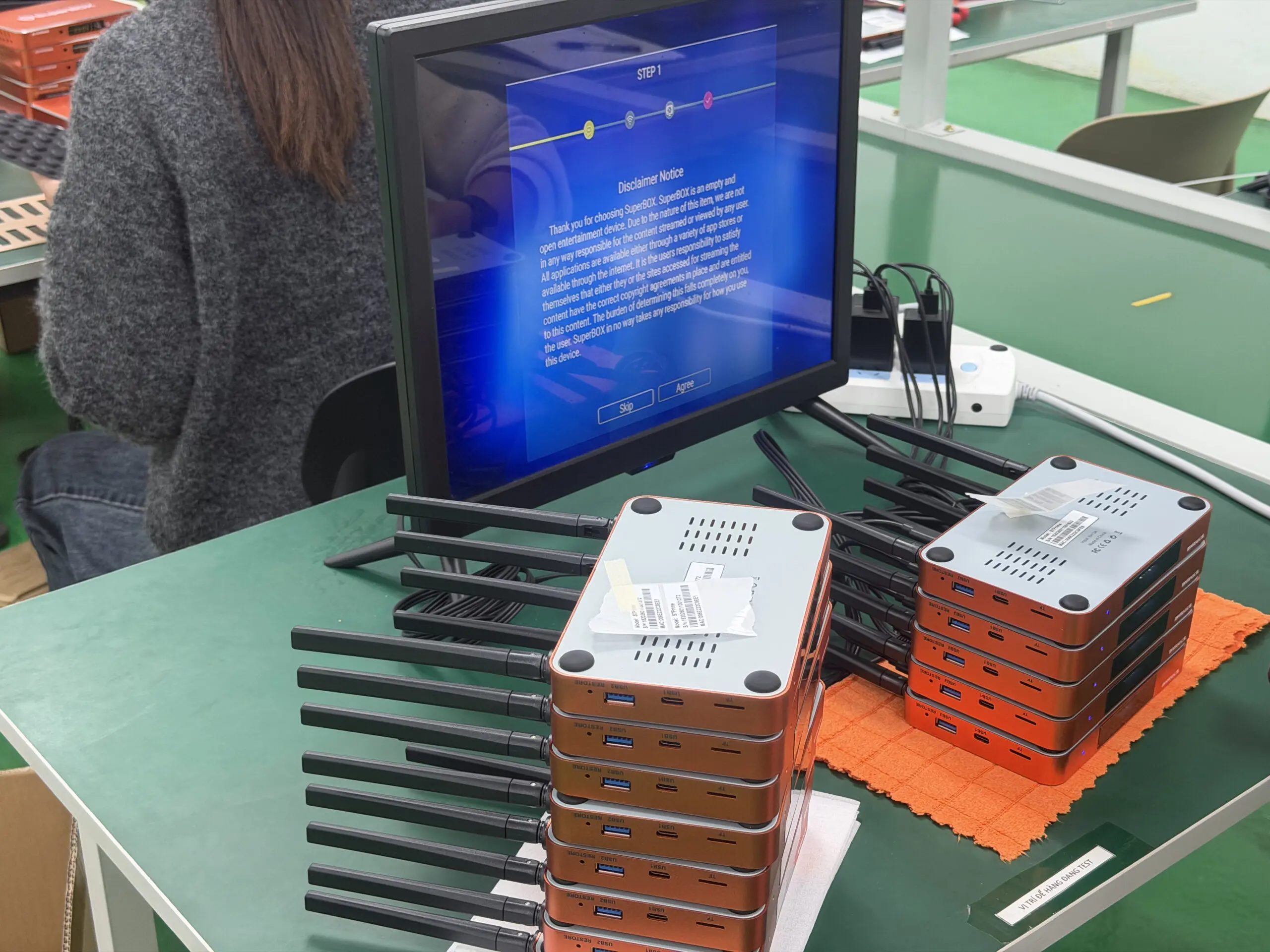 technicians performing superbox hardware inspection